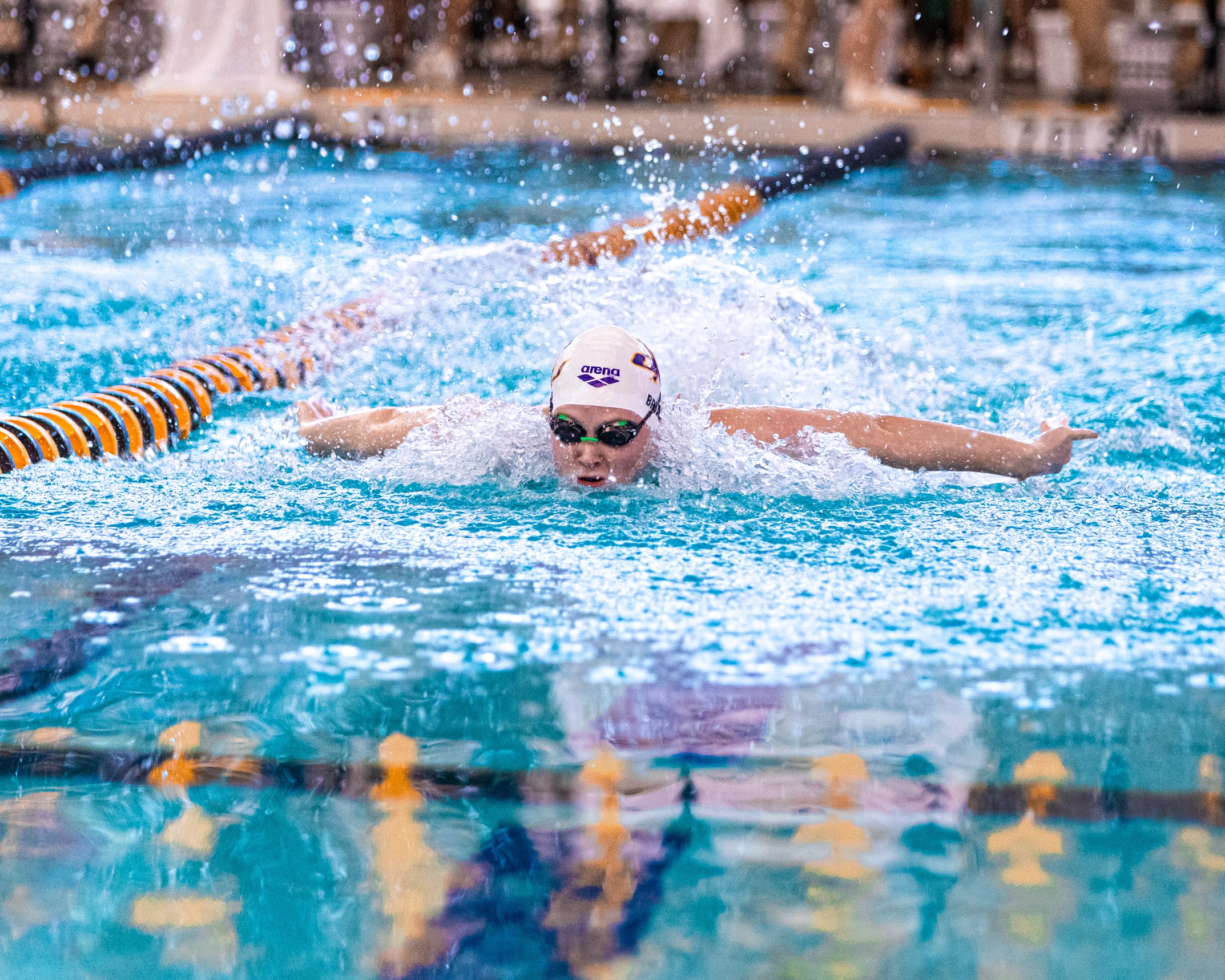 WOMEN DEFEAT ST. AMBROSE; MEN DROP DUAL